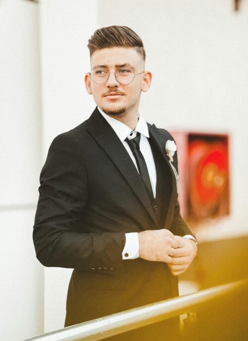 elegant bridegroom in tuxedo