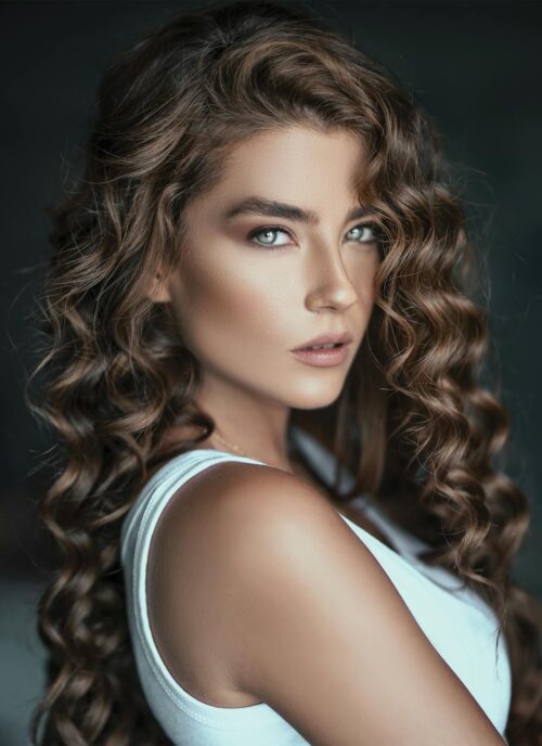 photo of woman wearing white shirt