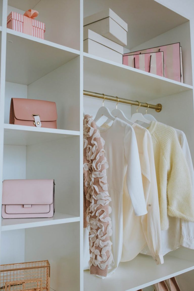 white wooden shelf with white textile